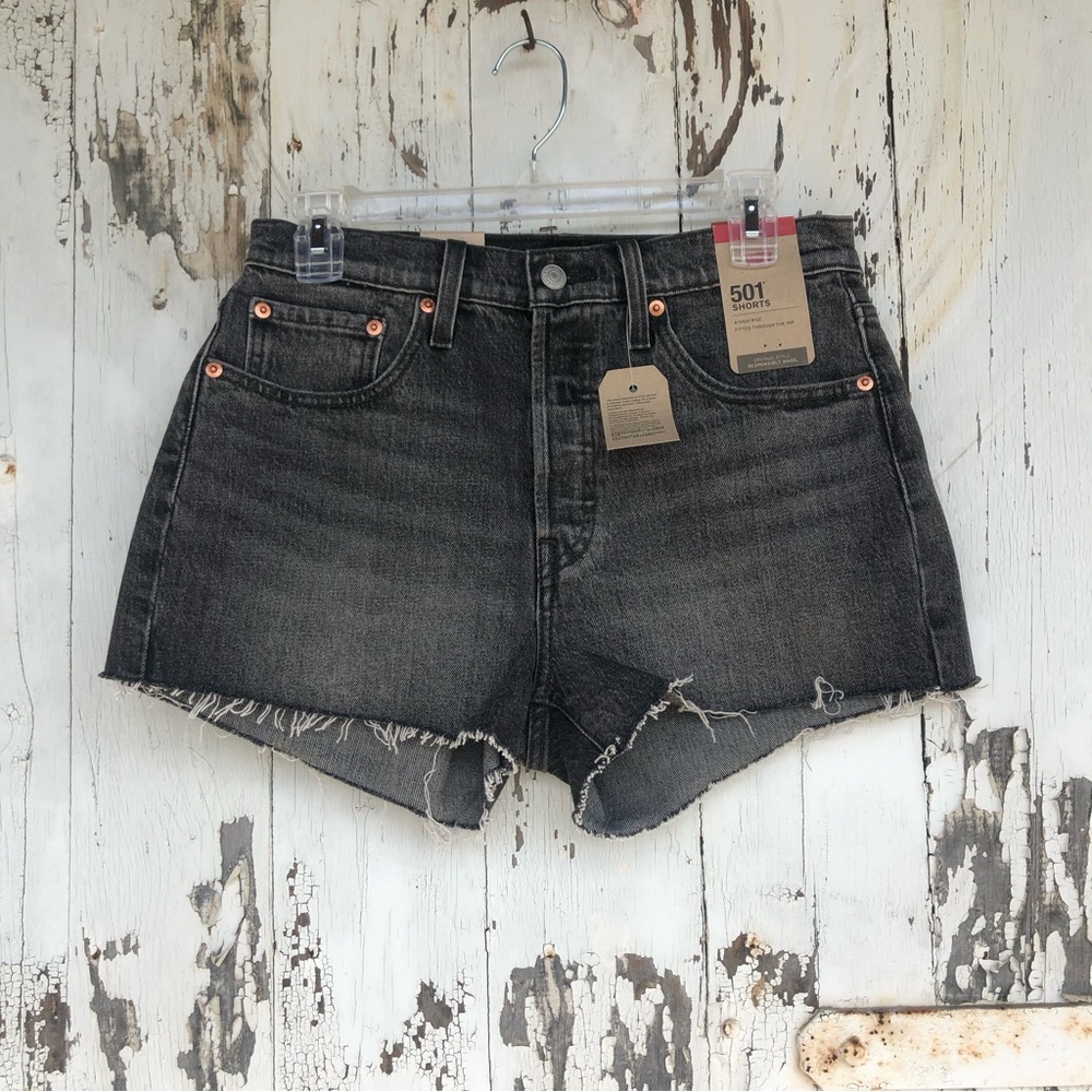 Levi’s 501 denim cutoff button-fly shorts. Size 27. Dark grey.